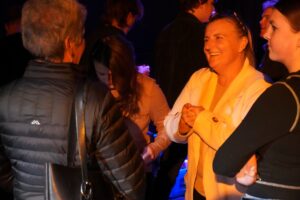 A happy woman talking.